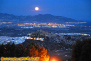 full moon above Salobre&ntilde;a's castle